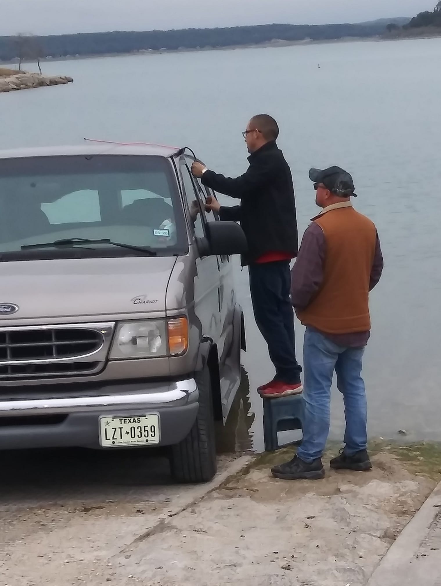 Nick unlocking a Ford van at a lake — roadside lockout service